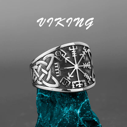 Silver Viking Compass ring with intricate designs on a gray background