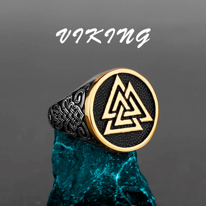 Viking ring with gold emblem on a dark background