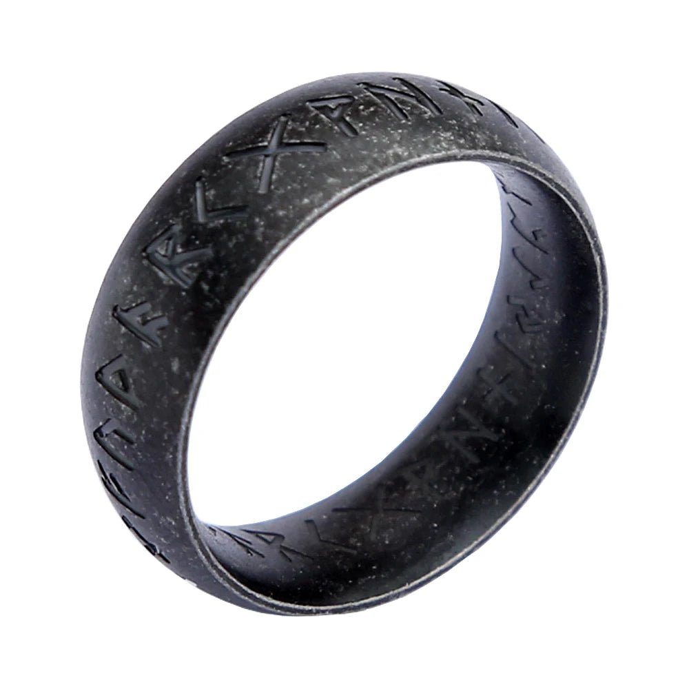 Black Viking Rune Ring with Norse rune engravings, angled side view.